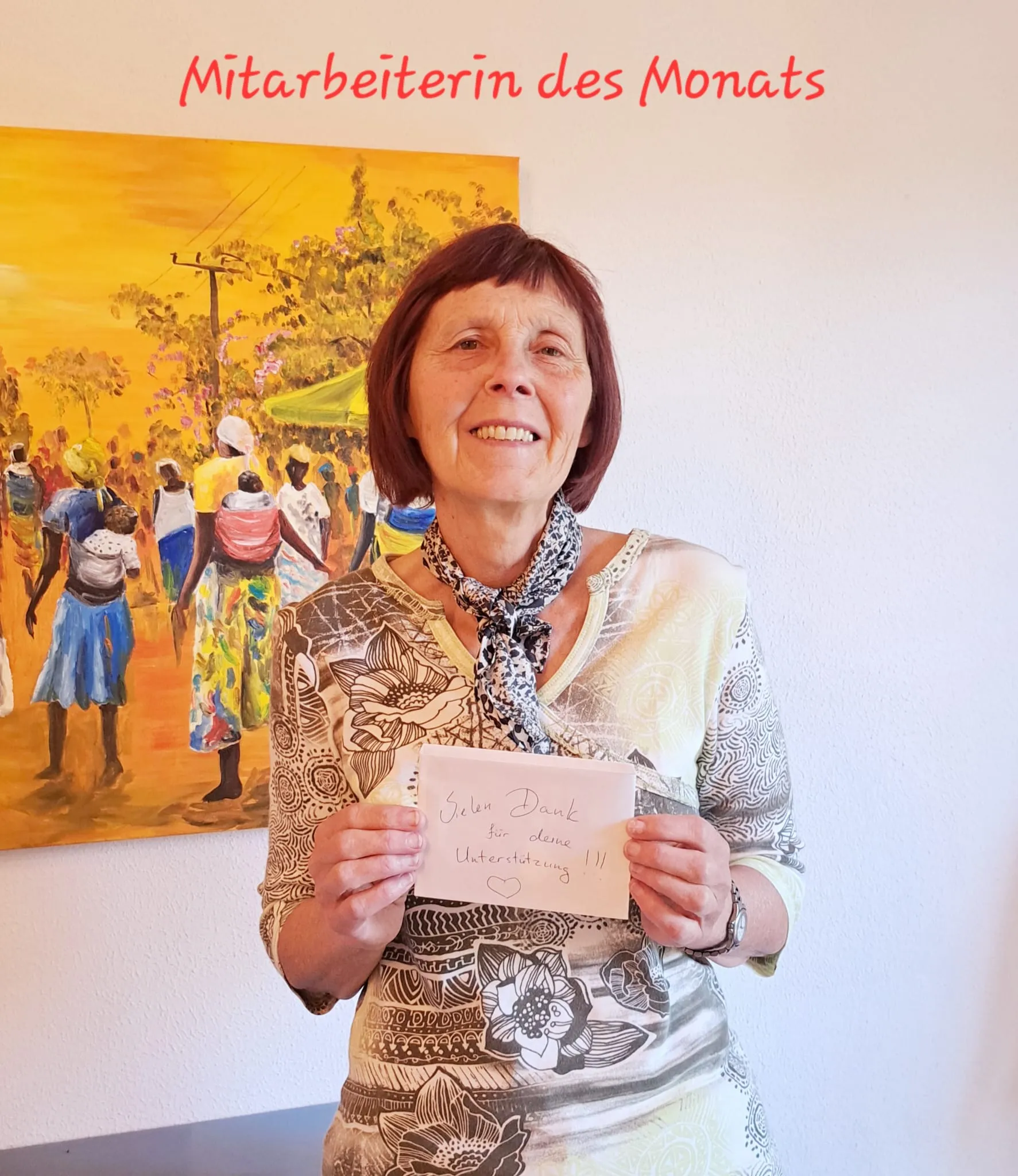 Kollegin Ulrike als Mitarbeiterin des Monats mit Dankeskarte